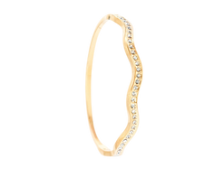 Gold bracelet with small stones on a white background