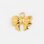 Gold bow charm