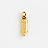 Gold Charm Skateboard