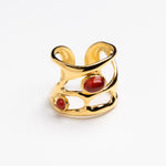 Organic openwork gold ring with red cabochons