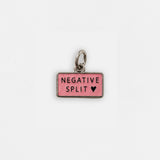 Negative Split Charm
