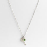 Silver Tennis Racket & Light Green Crystal Charm Necklace product photo