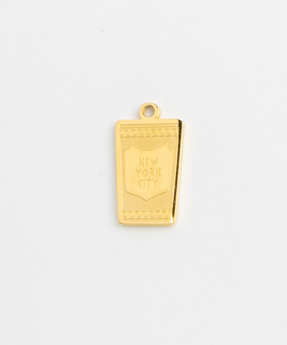 Gold New York City shield tag charm