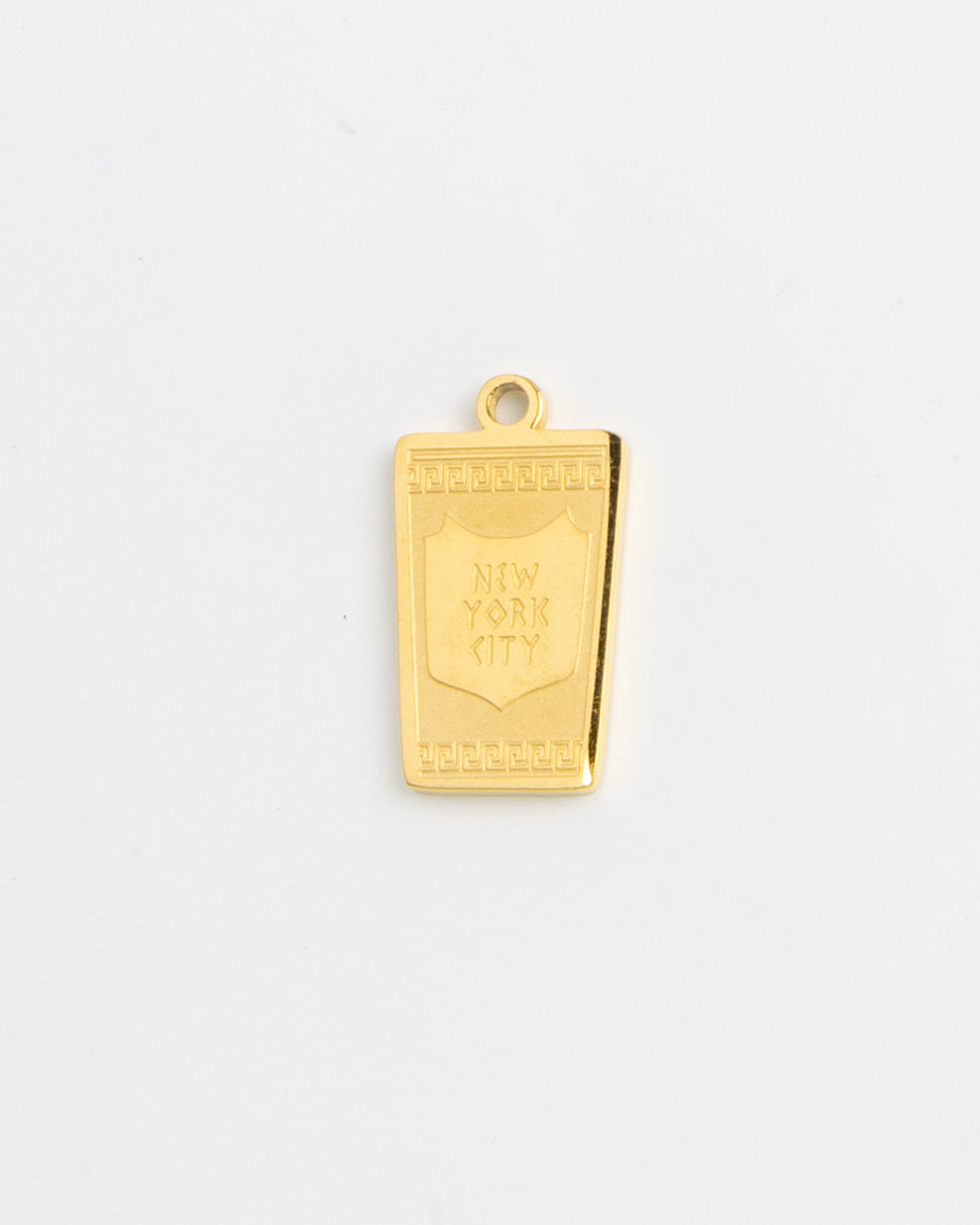 Gold New York City shield tag charm