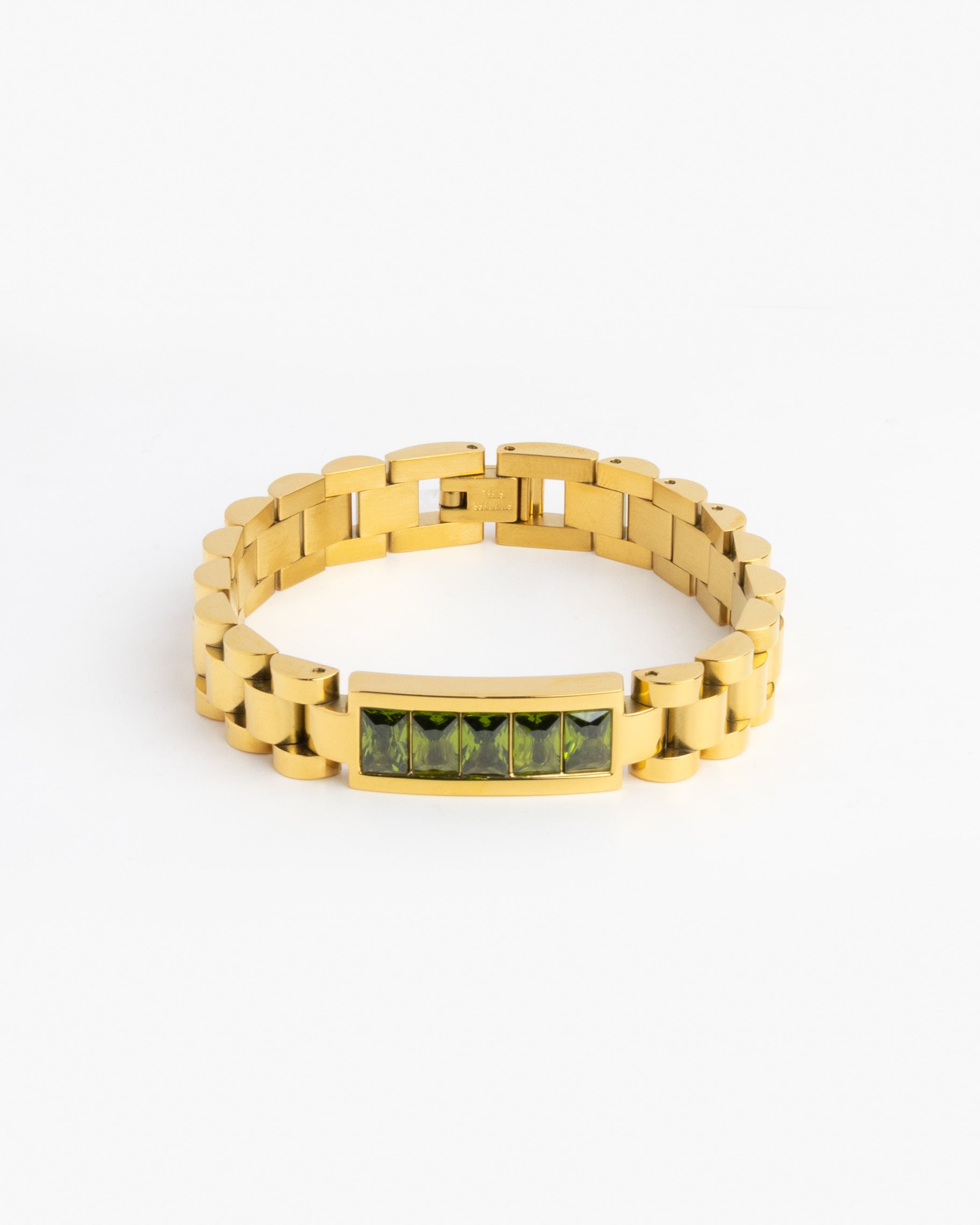 Gold watch-link bracelet with green emerald cut stones