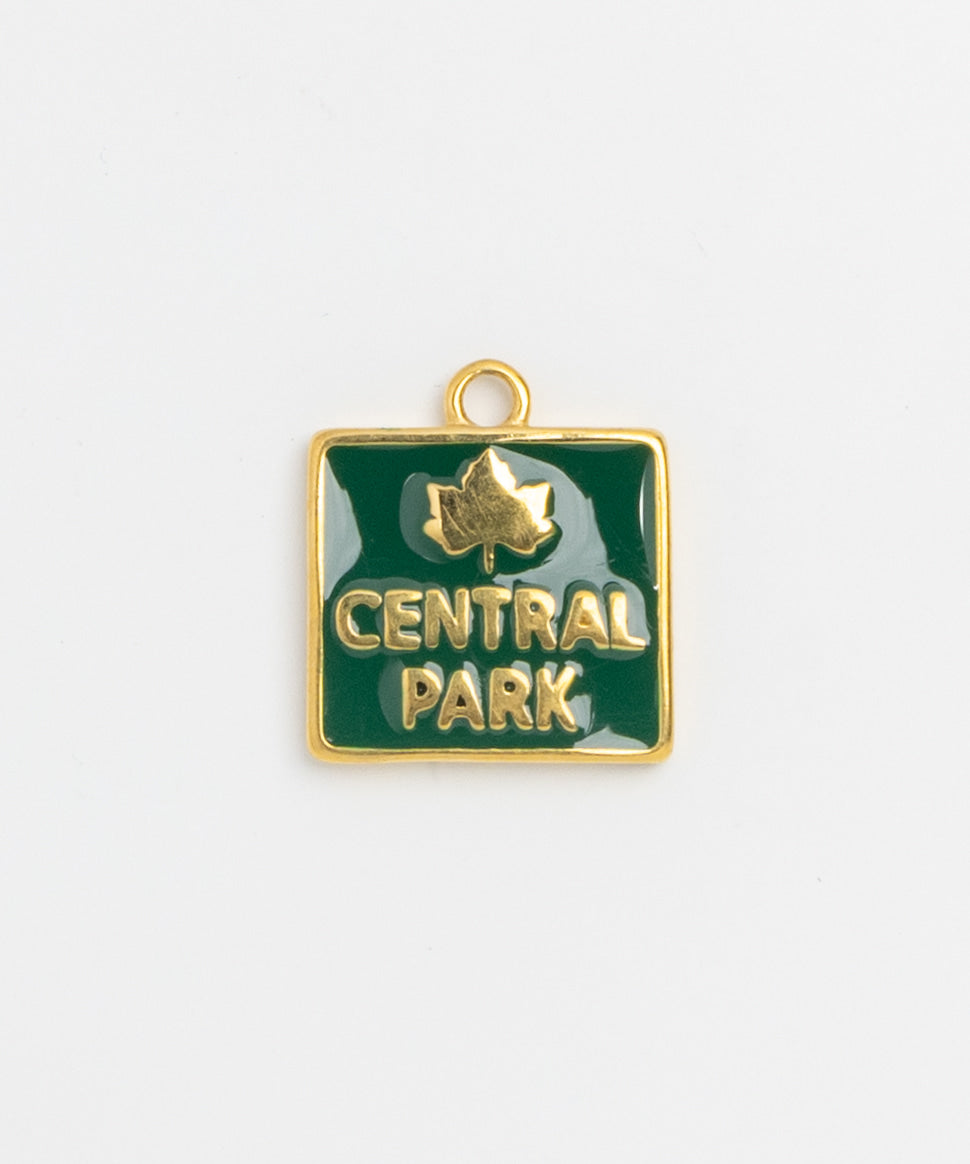 Green enamel Central Park charm with gold leaf