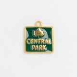 Green enamel Central Park charm with gold leaf