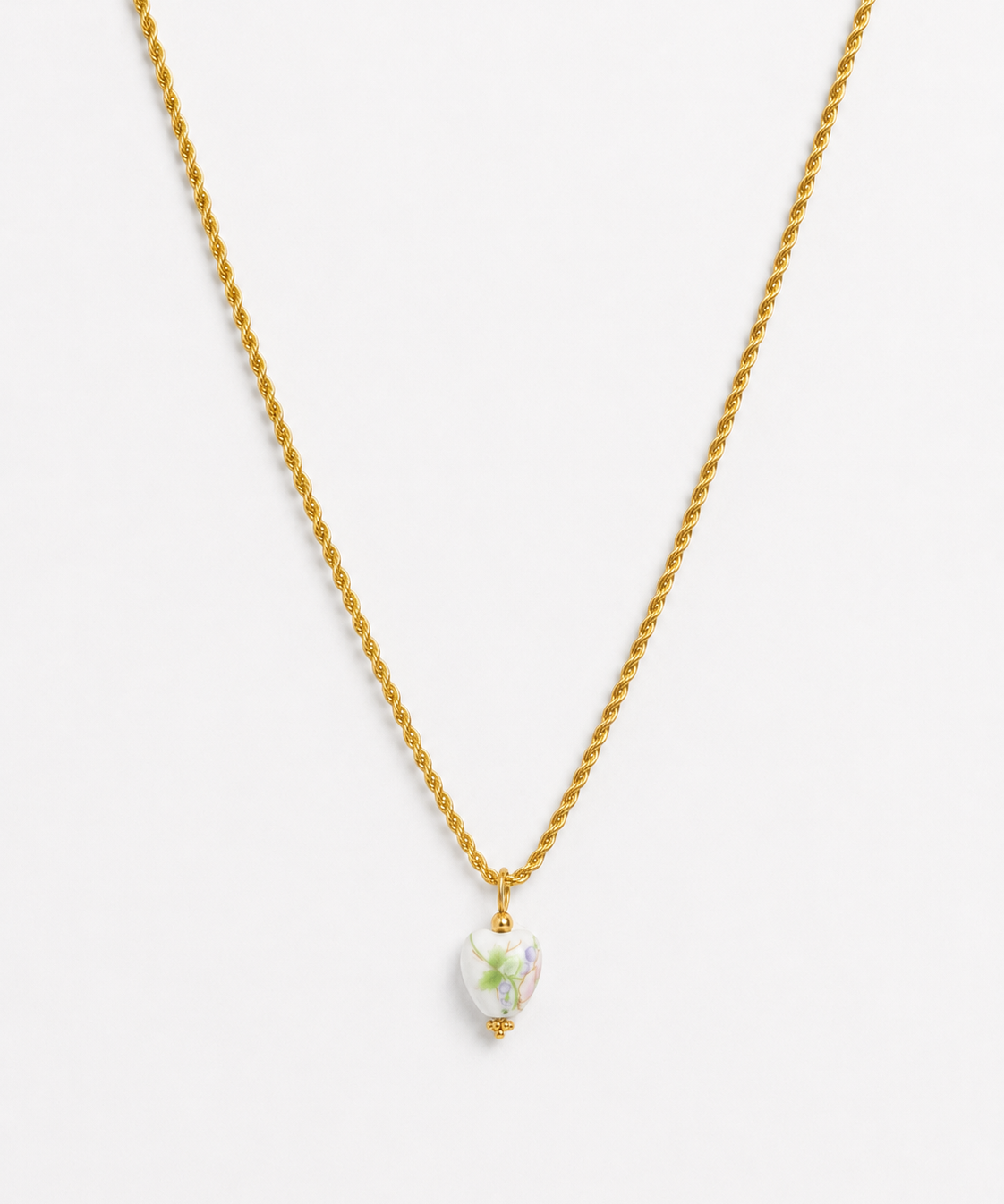 Gold rope chain necklace with heart shaped floral porcelain bead pendant
