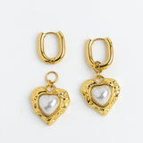 Gold heart charm earrings with faux pearl center