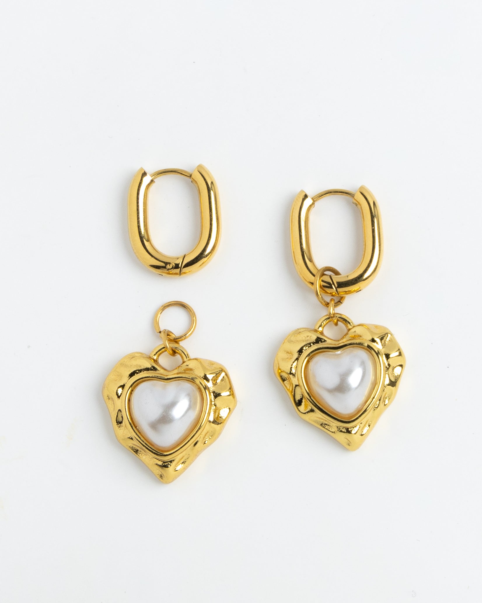 Gold heart charm earrings with faux pearl center