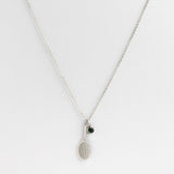 Silver Tennis Racket & Dark Green Crystal Charm Necklace product photo