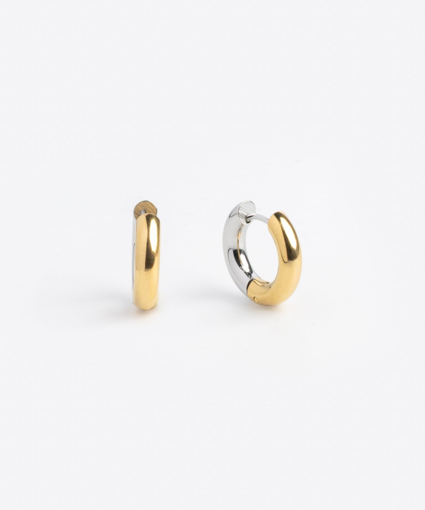 Two-tone gold and silver huggie hoop earrings