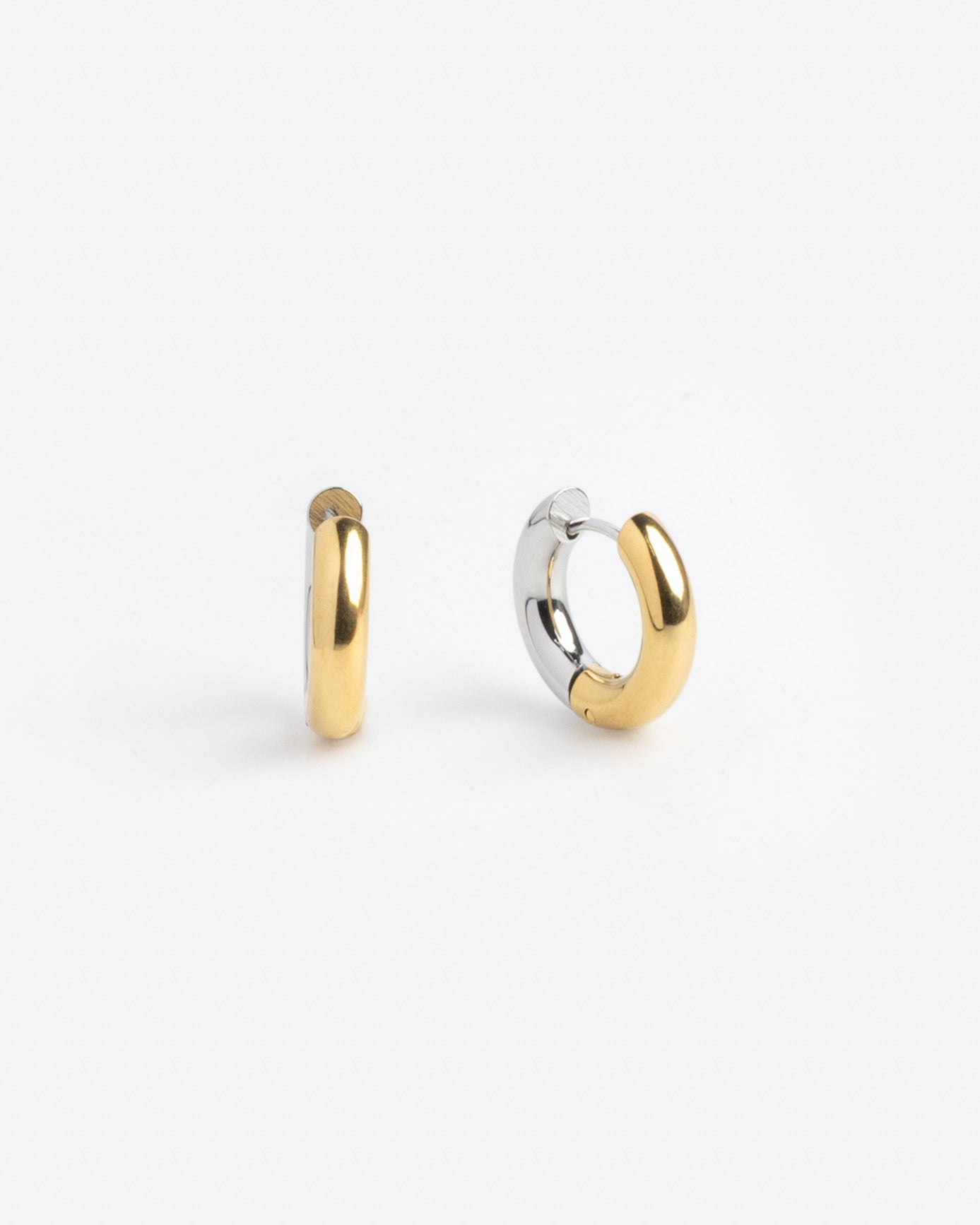 Two-tone gold and silver huggie hoop earrings