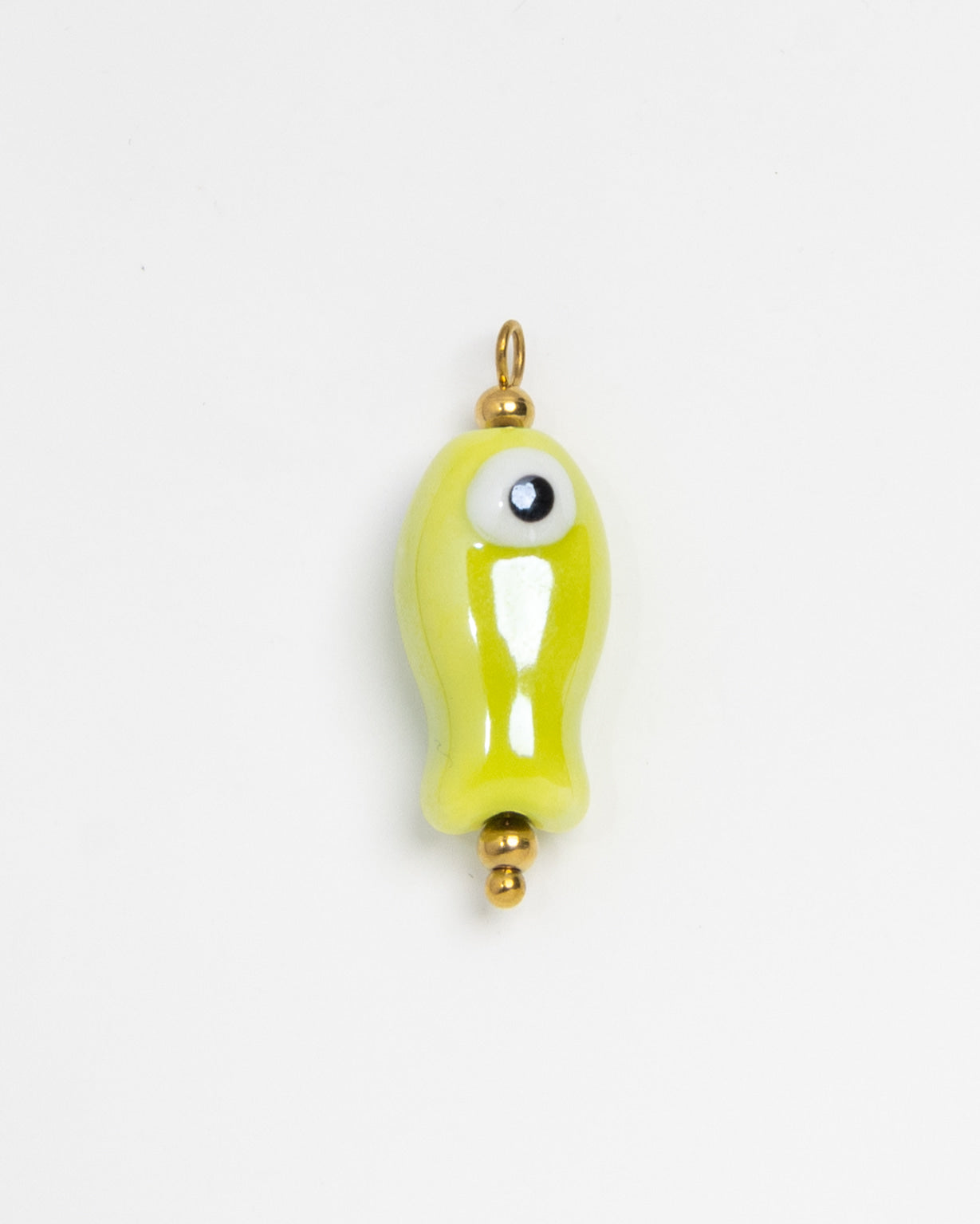 A small glossy lime green fish-shaped charm with a single large white eye and gold-tone metal loop at the top, shown on a plain white background.